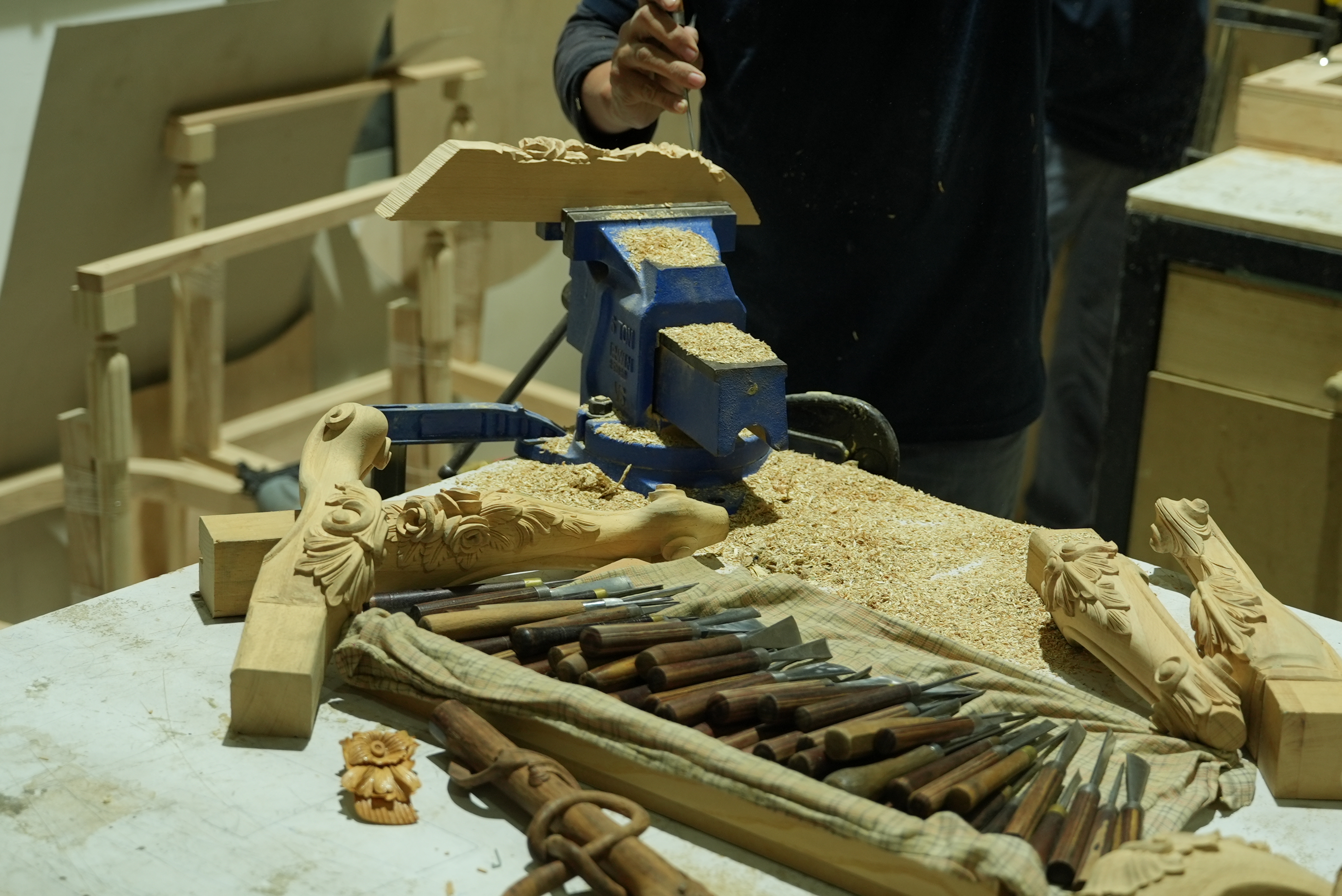 Hand-carved bespoke wood ornaments — Blueline furniture workshop