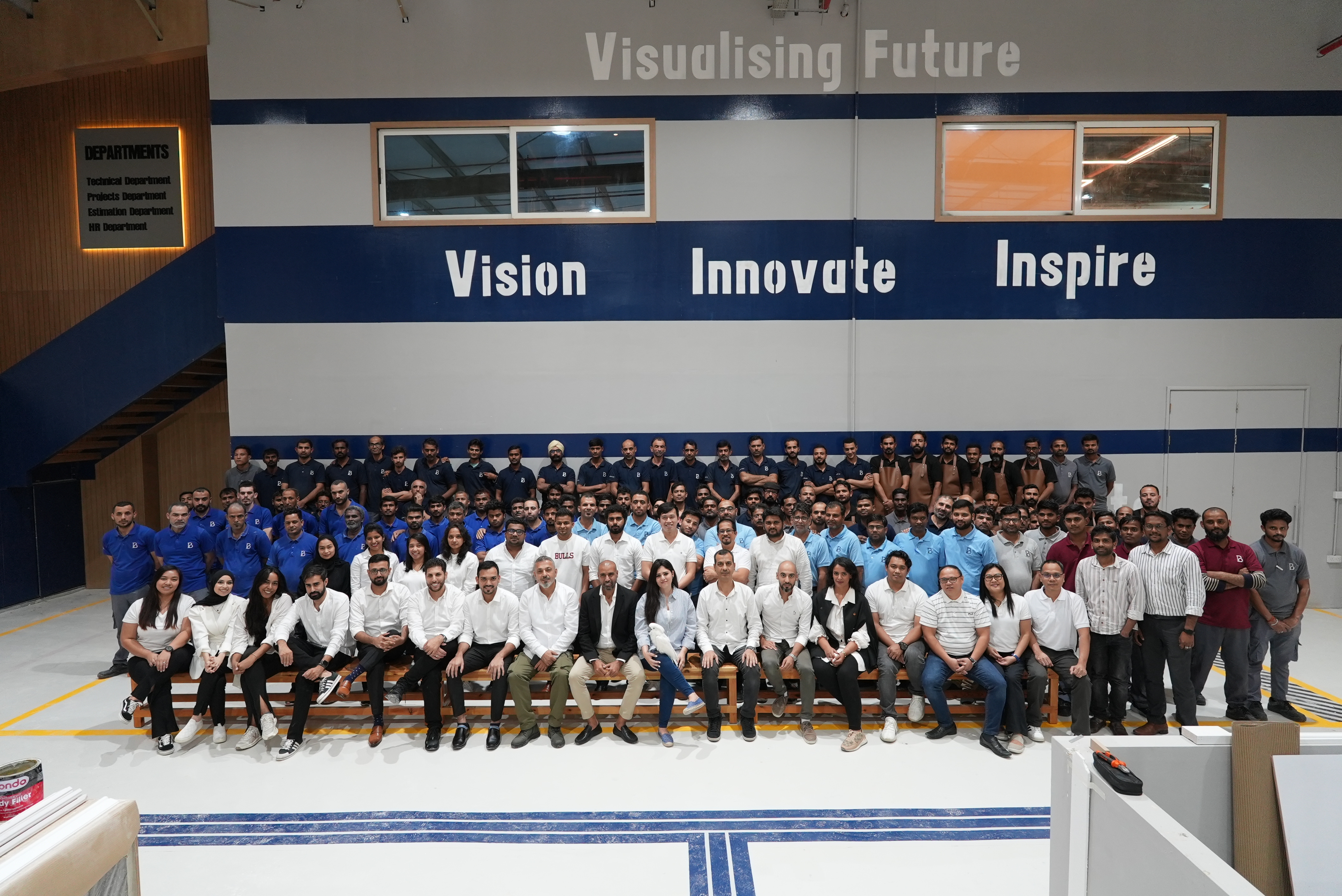 The full Blueline team — Vision, Innovate, Inspire — at our Dubai production facility